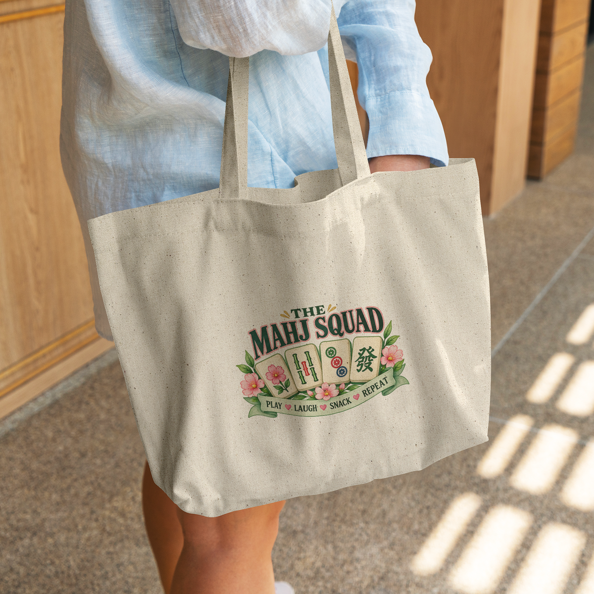 Mah_Jongg_Tote__The_Mahj_Squad_CottonTote_L_WomanDigging_Mockup.png_16211562